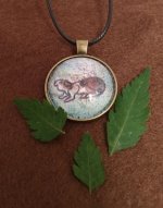 My handmade guinea pig pendants, if anyone would like one!