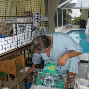 Bruce helping with the cages after my foot surgery